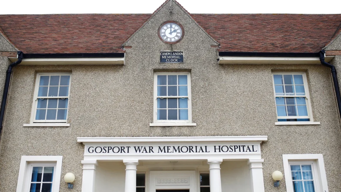 a building with a clock on the front