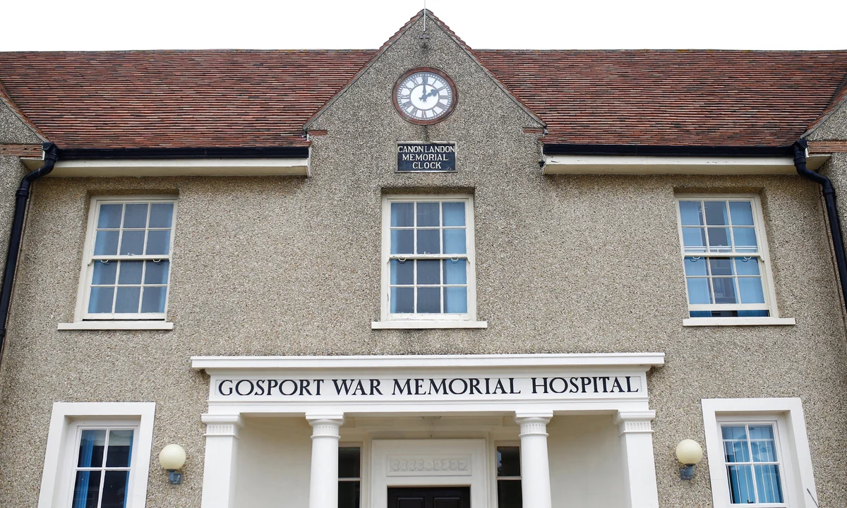 a building with a clock on the front